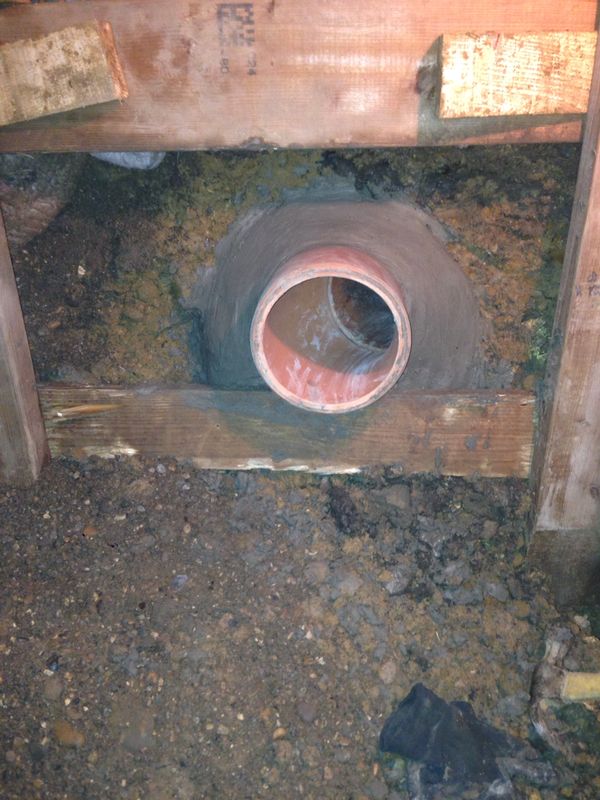 a drainage saddle connection in situ. 